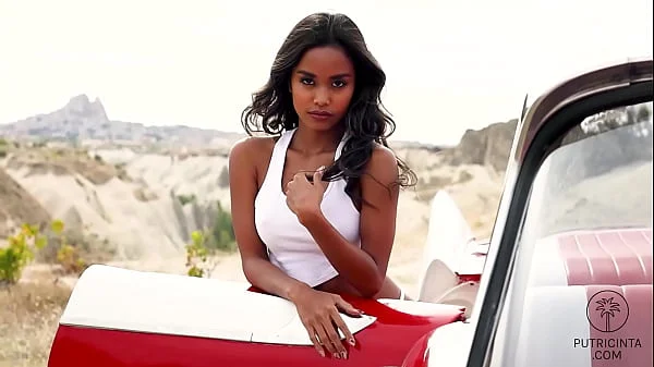 Asian Putri Cinta touching her round boobs and wet pussy