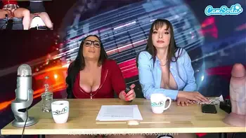 Camsoda - Lesbian MILFs Ride Sybian Orgasm On Air While Reading The News