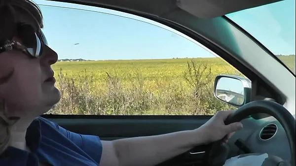 Sexy blonde MILF Frina drives car in stockings without panties under skirt. Auto navigator is broken. Sexy milf asked random passerby for further directions. No panties in public. No panties under skirt. Naked in public. Big natural tits Milf. Mini skirt