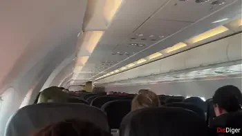 Risky public blowjob on a plane - we got caught!