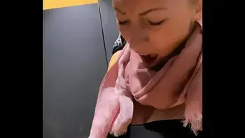 Secretly pussy fingered to orgasm in shopping center dressing room