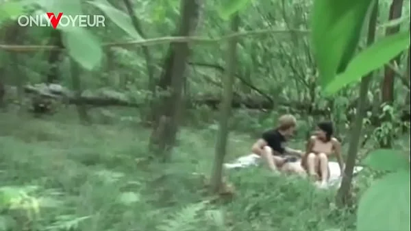 Beach Voyeur. Teen couple spotted fucking in a beach bushes