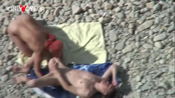 Beach Voyeur. Busty cougar MILF getting fucked by young guy