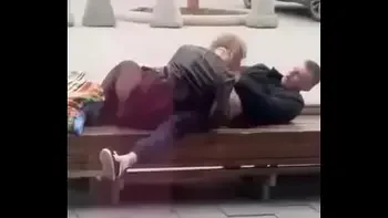 Stupid blonde gives blowjob in public