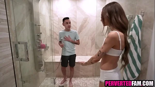 Step brother and step sister showering together