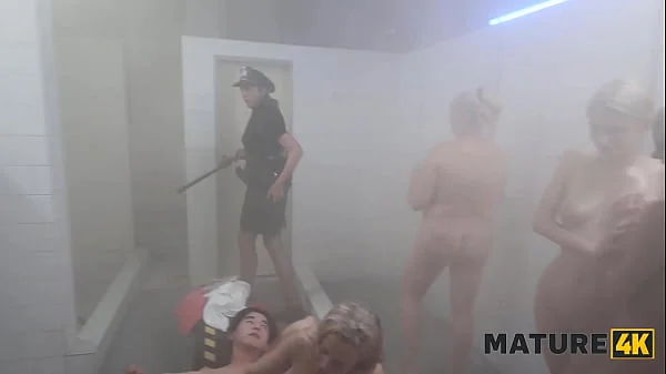 MATURE4K. Mature prison sluts are having a group shower sex with young cock