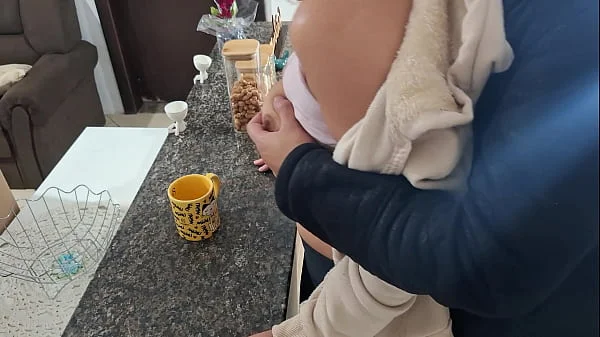 A stepdaughter is surprised while having breakfast.