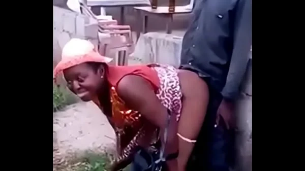 African woman fucks her man in public