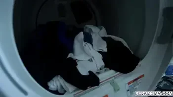 Stepson gets an eyeful as stepmom stands at the sink!