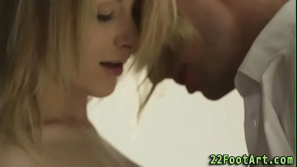 Footjob slut gets cumshot