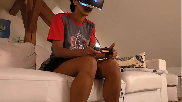 Isabel flashes her pussy and ass under her panties with a tshirt and she has a new game in her Playstation VR but she needs..