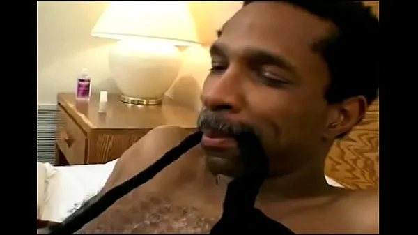 Latin floozie Mia Domore likes to play with man's huge black cock then she sits on his face and he whistles in the dark