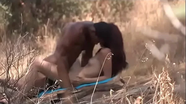 Black dude looks for horny babes at the nude beach and bangs one of 'em