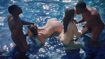 Isiah Maxwell and friends are having a good time in the pool with babes.