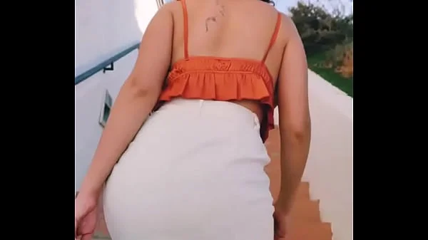 walking around with a dildo in her pussy