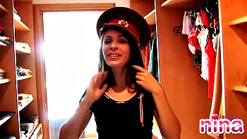 Lesbo Nina strips then gets dressed in the closest