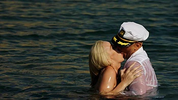 Kendra Sunderland rides a big dick on the beach with stunning tan lines.