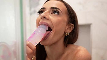 Petite teen Nikki Nicole wets her pussy in the shower