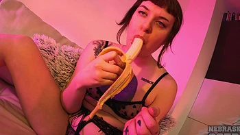 A delicious brunette plays with a vibrator and inserts it into her thong.