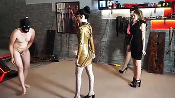 Latex Brunette Dominates Slave with Brutal Ballbusting
