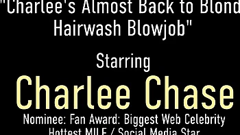 Busty milf Charlee Chase deep throats cock in bathroom