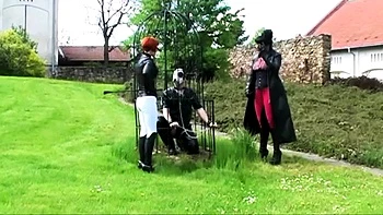 Domina Liza & Mistress Rouge Spank Redhead Outdoors