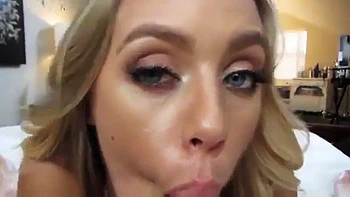 Blonde Babe Gives Deep Blowjob Behind the Scenes