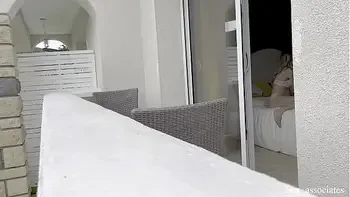 Hot spanish girl was secretly filmed in her hotel room through the window while she was taking some nude photes.