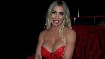 Carla Boom bounces fake tits on club stripper pole