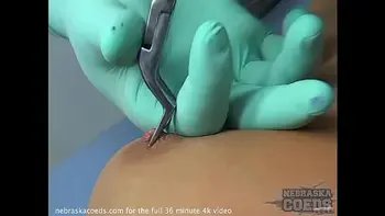 beautiful florida babes getting their nipples and clits pierced on vacation