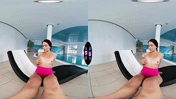 A young and beautiful girl, Vixi Rafi, has fun by the pool in vr
