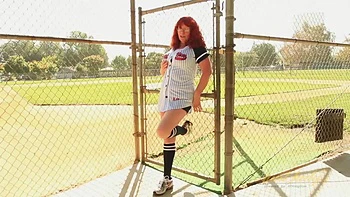 Suzanne strips and fingers her mature pussy